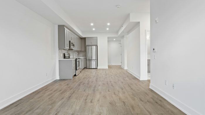 brown wooden parquet floor and white wall